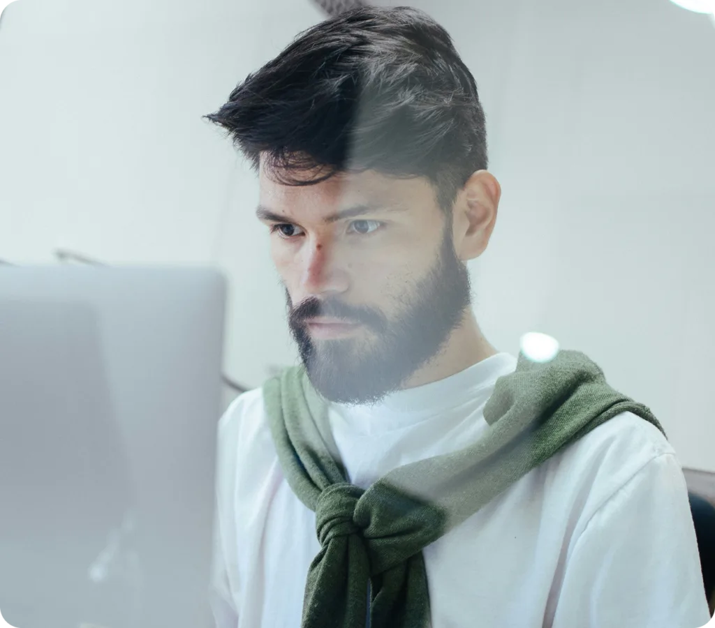 Man looking at screen in office