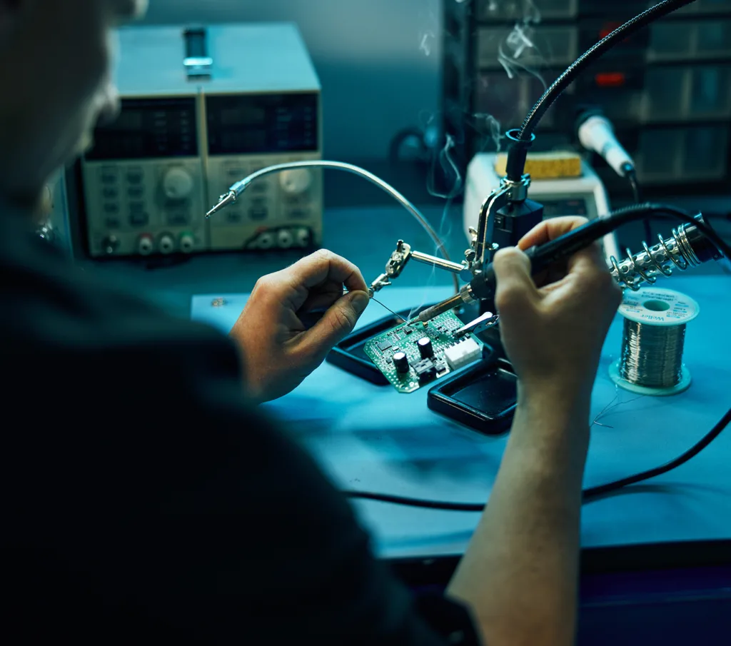Employee working on technical parts