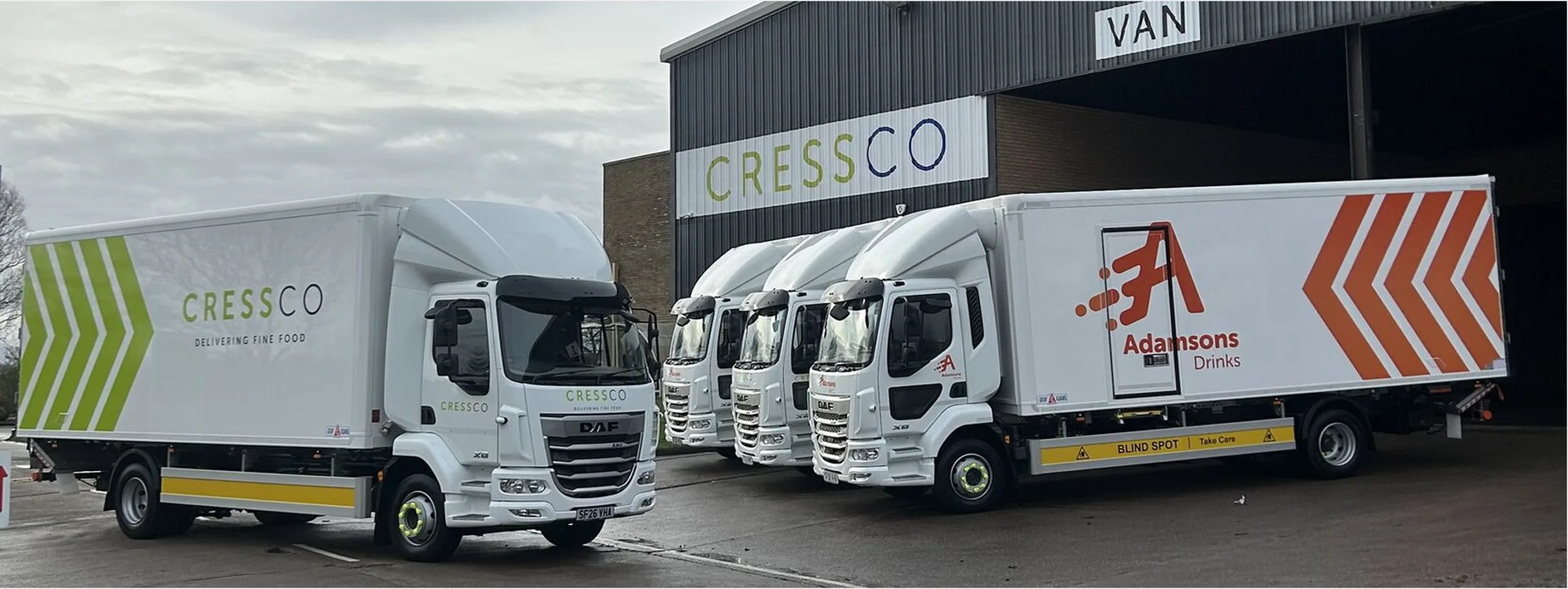 Multiple trucks in parking lot from The Cress Company